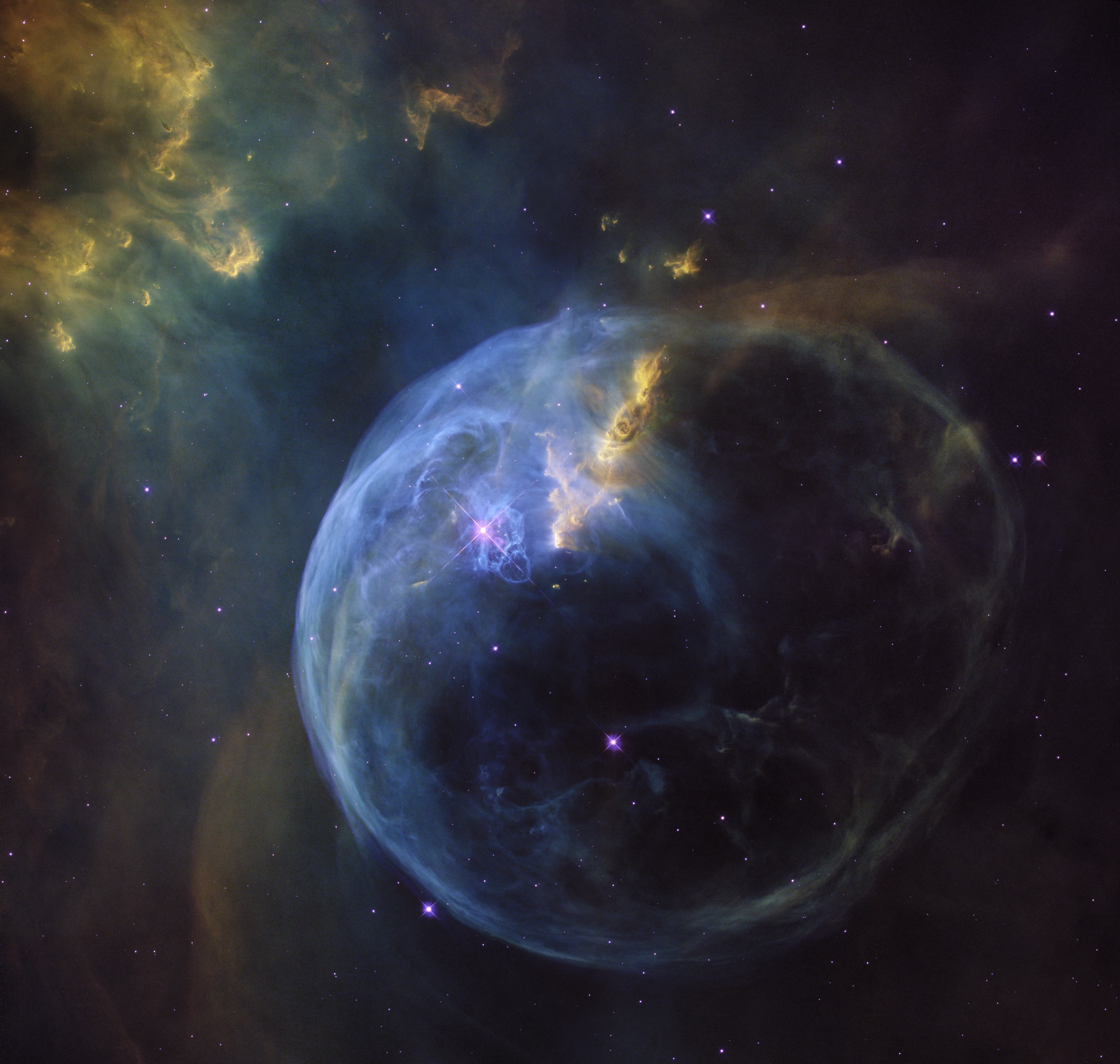 NGC 7635, also known as the Bubble Nebula, Sharpless 162, or Caldwell 11, is an H II region emission nebula in the constellation Cassiopeia. It lies close to the open cluster Messier 52. The 'bubble' is created by the stellar wind from a massive hot, 8.7 magnitude young central star, SAO 20575.